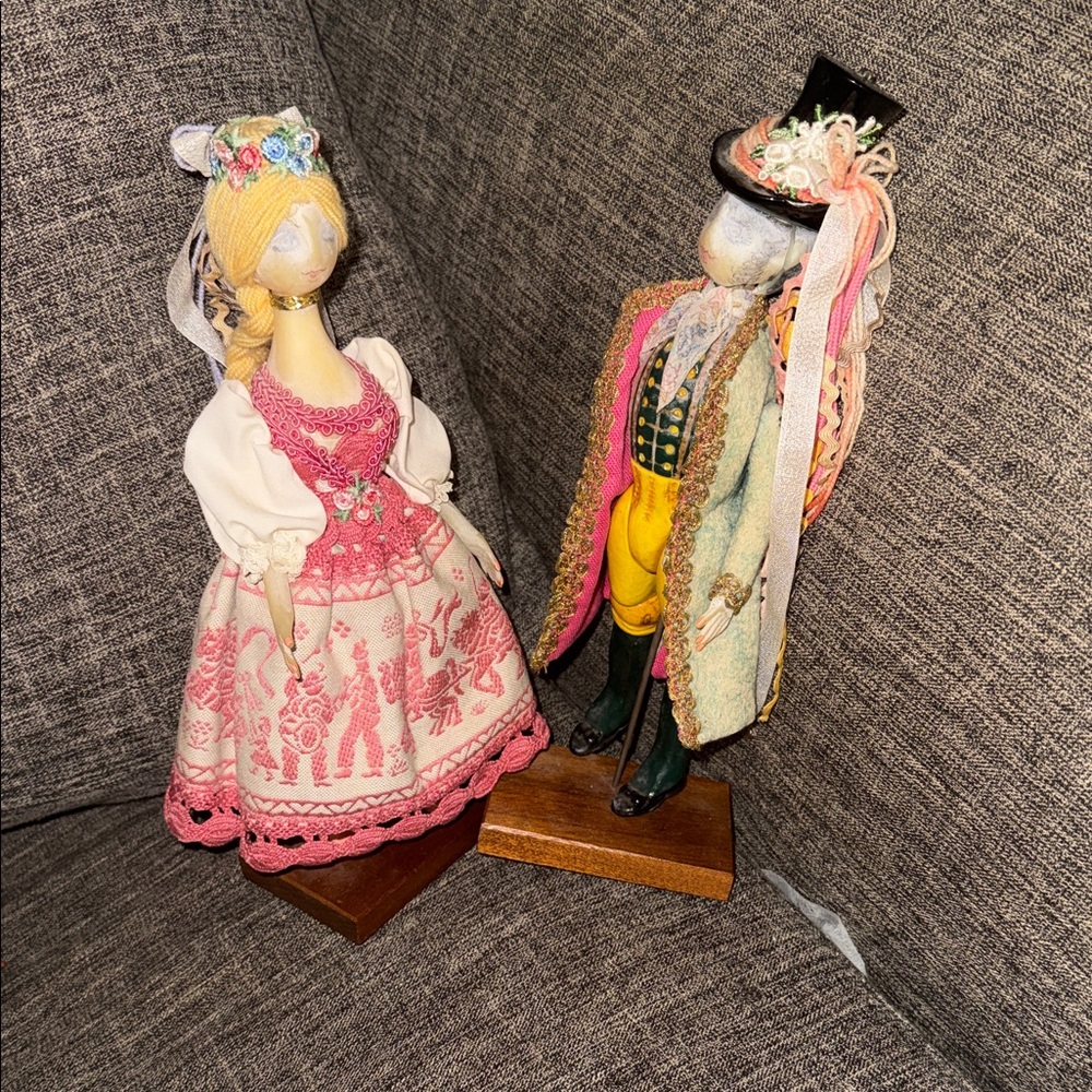 Vintage Folk Art Dolls with Pink and Yellow Outfits